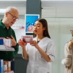Man getting help from a pharmacist