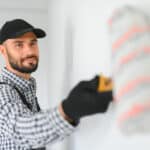 Man painting a wall