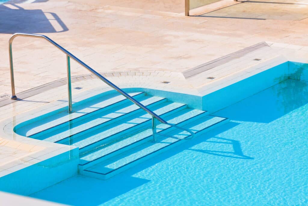 Poseidon Pools: Voted Best Customer Service for Pool Builders in Louisiana 2025 22 outdoor-swimming-pool-with-staircase