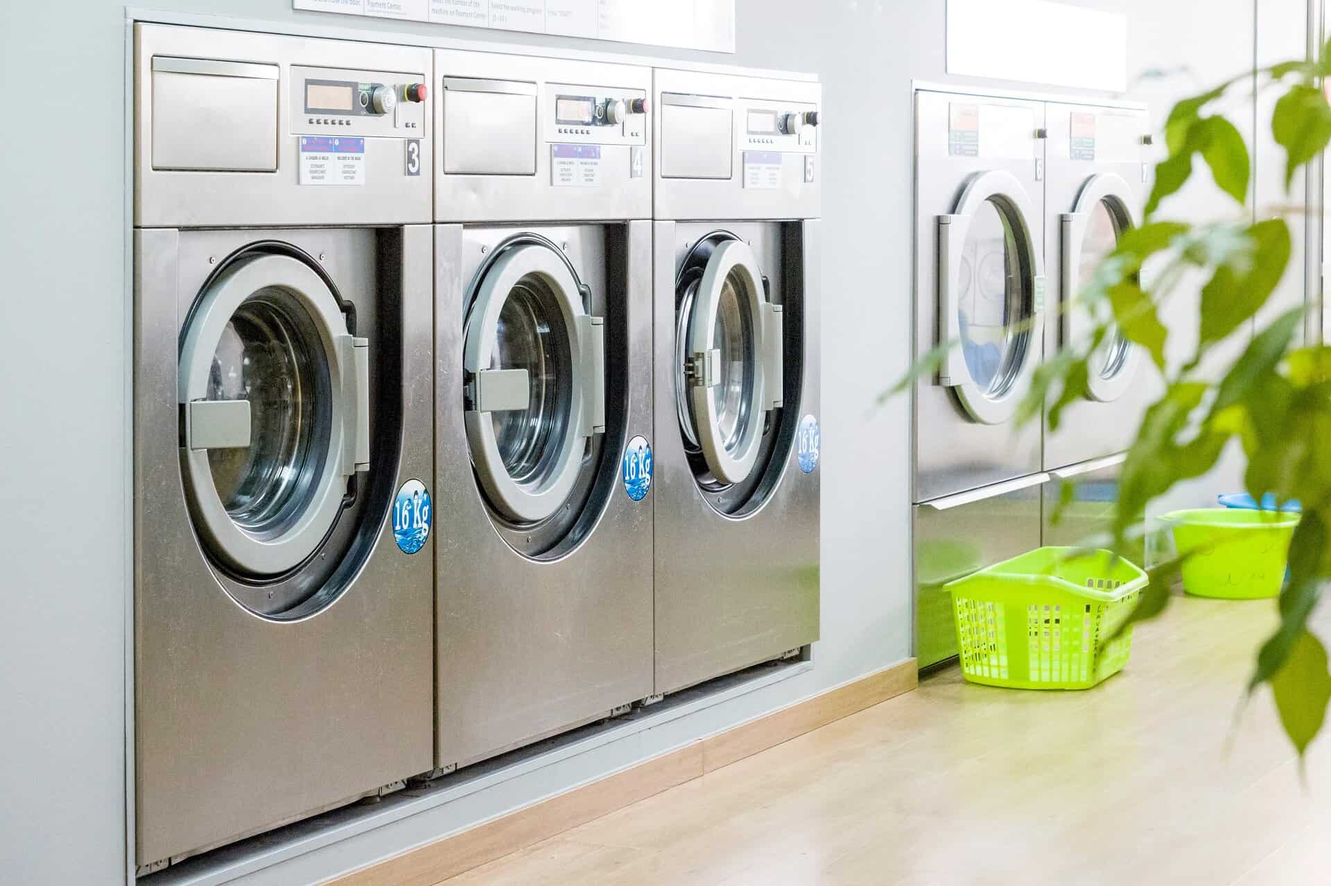 ITEC Laundry Corp: Voted Best Customer Service for Commercial Laundry Equipment and Service Provider in Louisiana 2026 93 Public laundry with modern, silver washing machines in a row