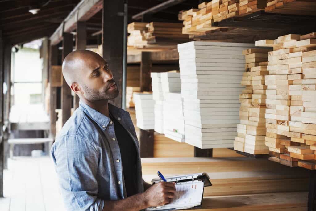 Man in lumber yard