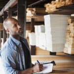 Man in lumber yard